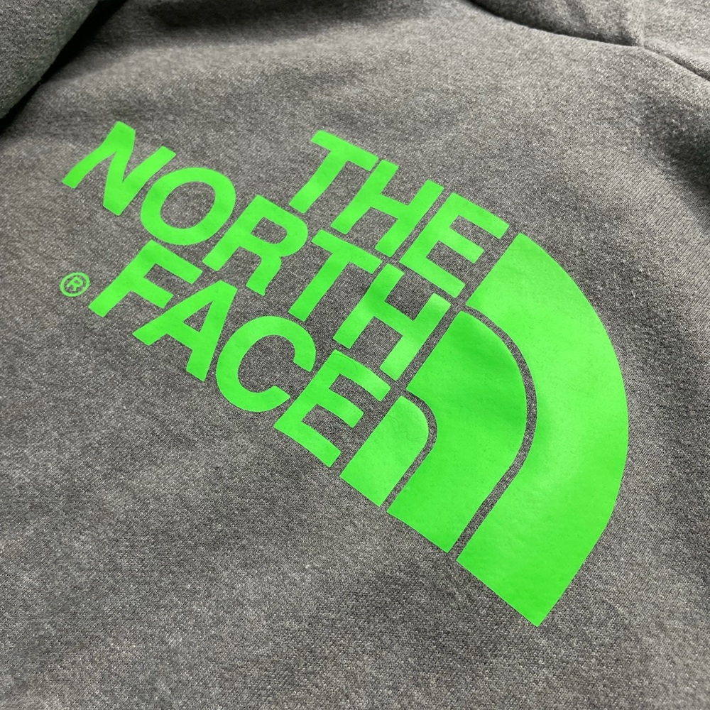 Grey and green North face hoodie, great condition never worn, size small